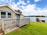 Side view to lake with deck