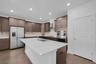 Kitchen w SS appliance/pantry