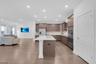 Kitchen w/ quartz counters