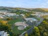 Everything your family needs without leaving the community: a large swimming pool, baseball and softball fields, tennis courts, and a full sports cent