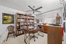 Currently used as a home office, this bedroom can easily go back to being a comfortable room for anyone in the family