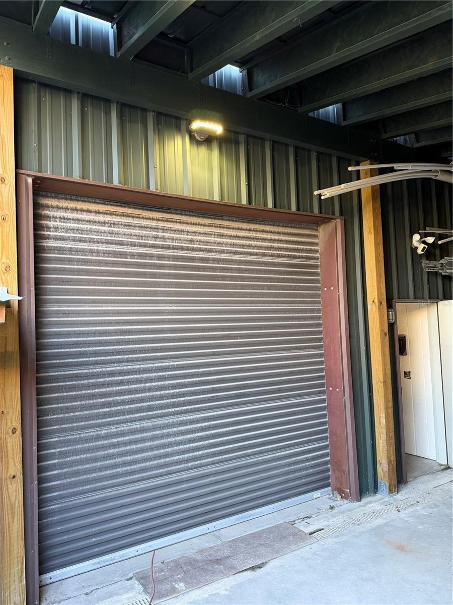 10X10 roll up door off back to canopy area
