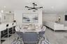 Kitchen to dining area to living room