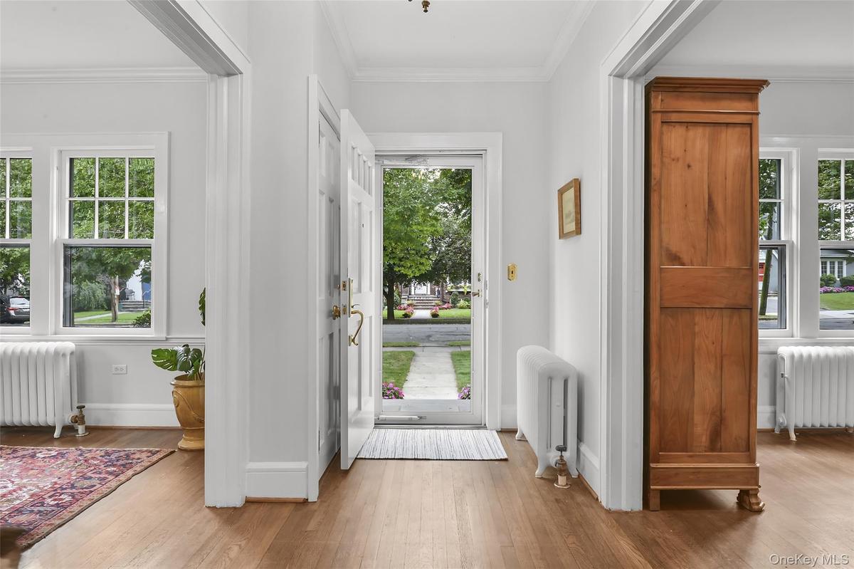Entry with coat closet. Entry chandelier excluded.