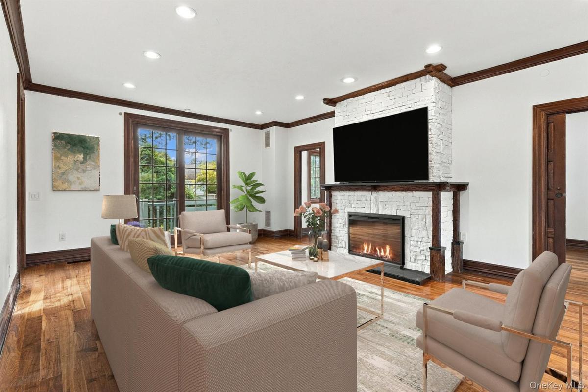 From fireplace to backyard, the living room connects it all.