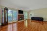 Living room with wood buring fireplace
