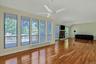 Living room with wood buring fireplace
