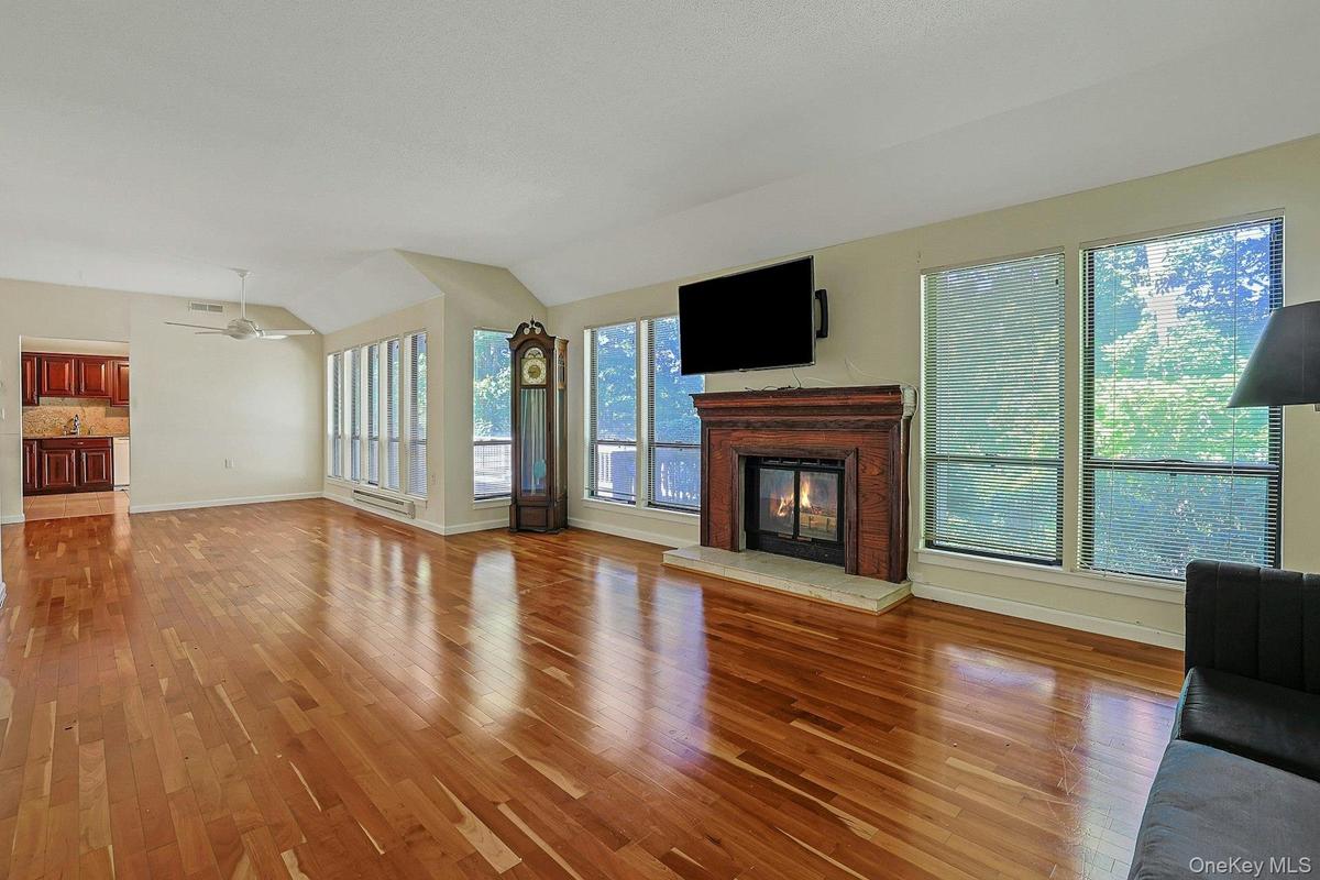 Living room with wood buring fireplace