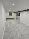spacious finished basement With rear entrance
