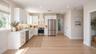 ADU kitchen - 2nd floor. Virtually staged