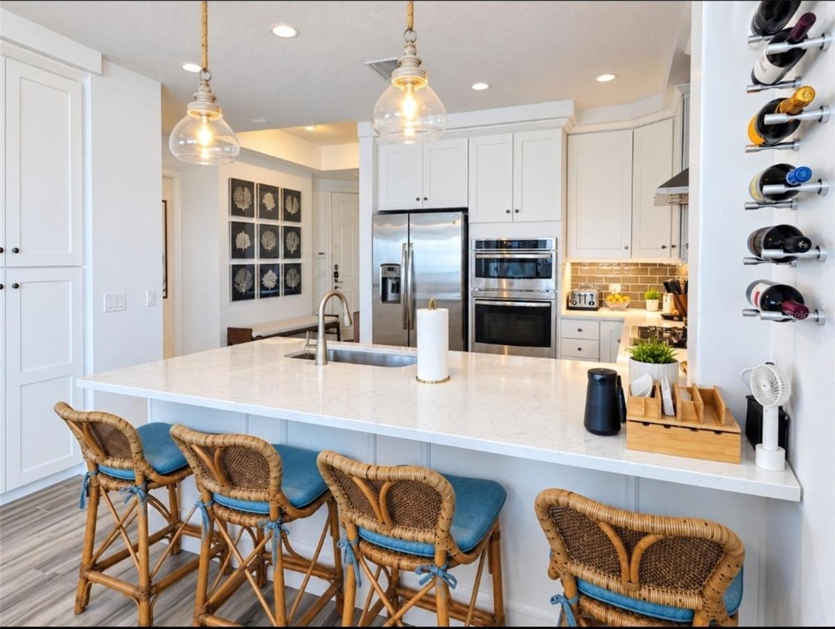 DIRECT OCEAN    FRONT CONDO WITH A WRAP-A-ROUND BALCONY.