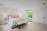 The primary bedroom is conveniently located on the first floor of the home.
