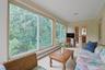 Sunroom overlooking private backyard
