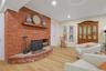 Sitting area where you can warm up to the fireplace