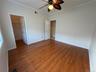 2nd bdrm, lovely exposure, large arched window, large walk-in closet