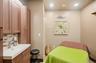 Massage/treatment room with shower and sink