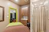 Massage/treatment room with shower and sink