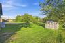 1 acre with side and back grassy areas.