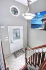 foyer with staircase to main level