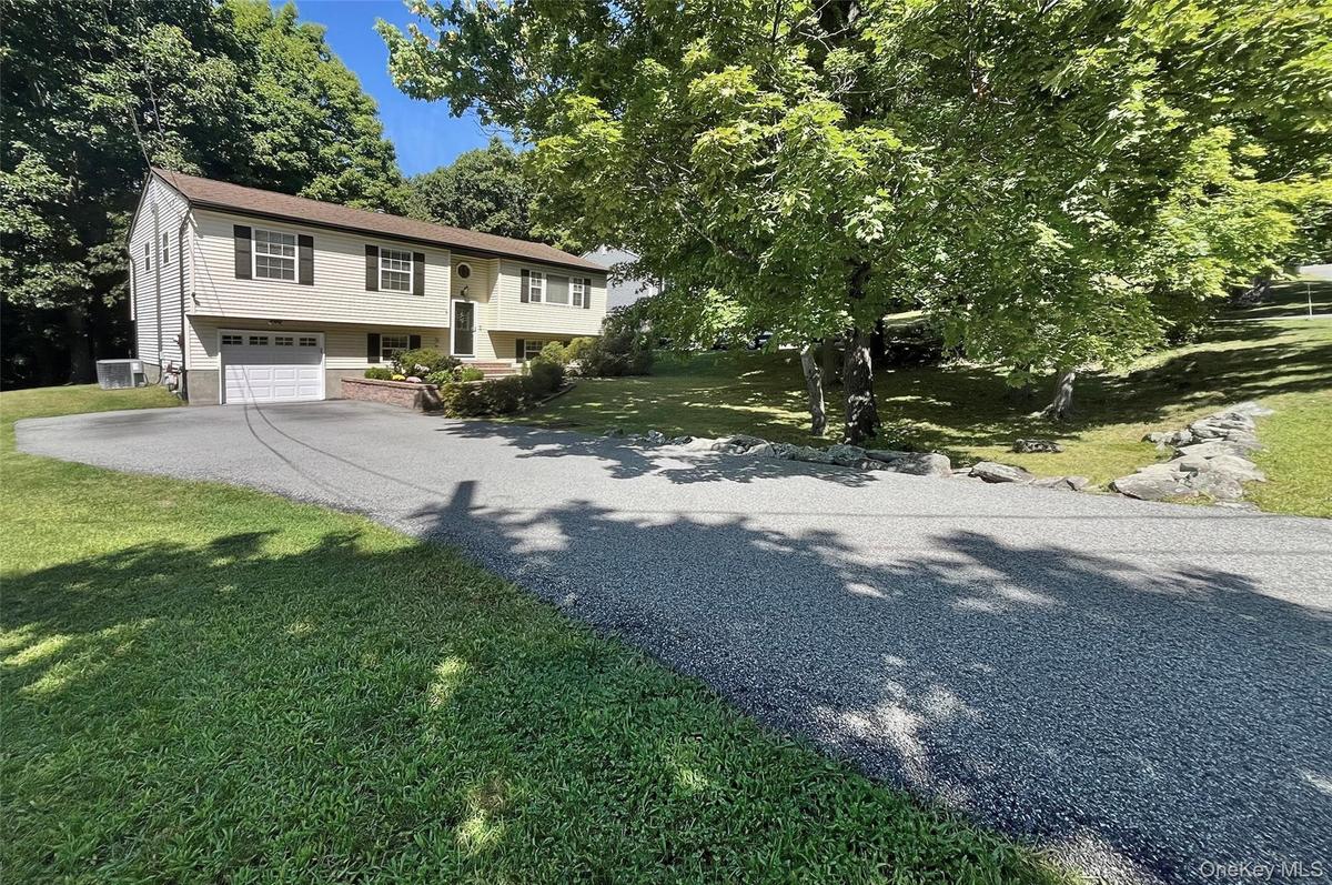 with sizable driveway