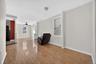 Unfurnished room with light wood-style floors and ceiling fan