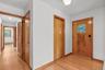 Entry foyer with pristine oak floors