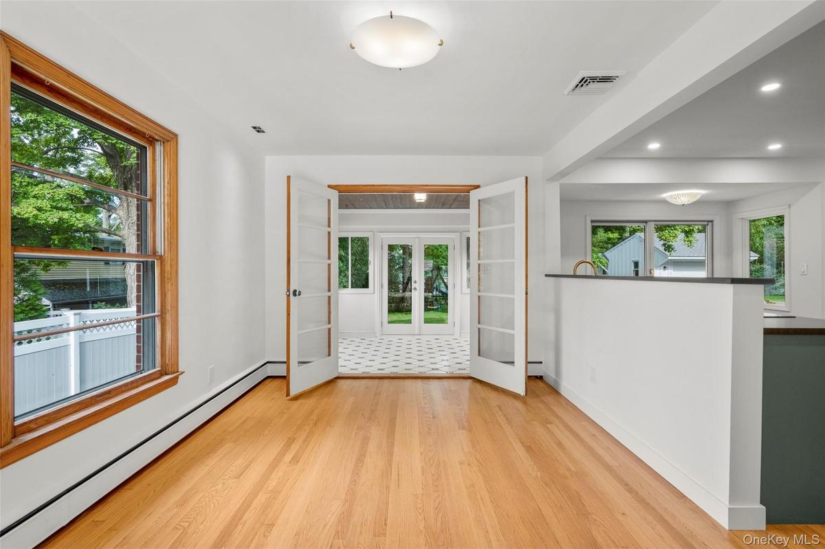 Dining area opening in to the sunroom