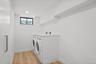 Laundry room with storage