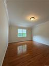 Oversized and generous, this main level primary is delightful w/ dual walk in closets, full bath
