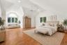 large 3rd bedroom on 2nd level . Virtually staged to show space