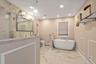 Bathroom #1En-suite spacious walk-in shower and soaking bathtub.