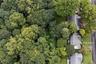 Immediately behind the house is the Jack Harrington Greenway.  This is City property with a walking trail.  It offers tremendous quiet and privacy to 