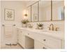 The ensuite Primary Bathroom on the second floor offers a dual sink vanity.