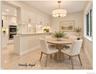 Just beyond the kitchen is a breakfast bar and room for a dinette seating area.