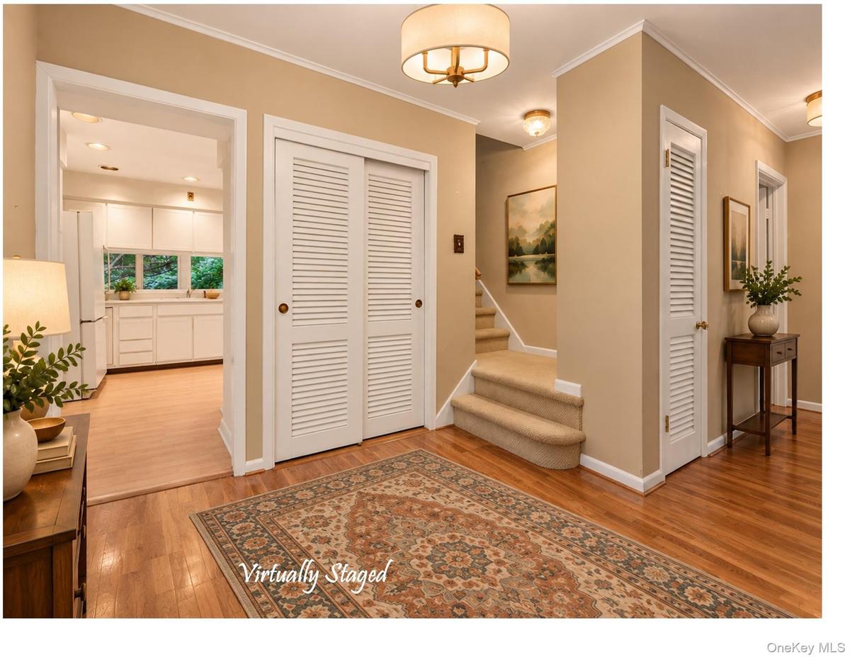 The entry hall is generously sized and welcoming.