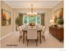 The dining room is oversized, offering room for gracious entertaining.