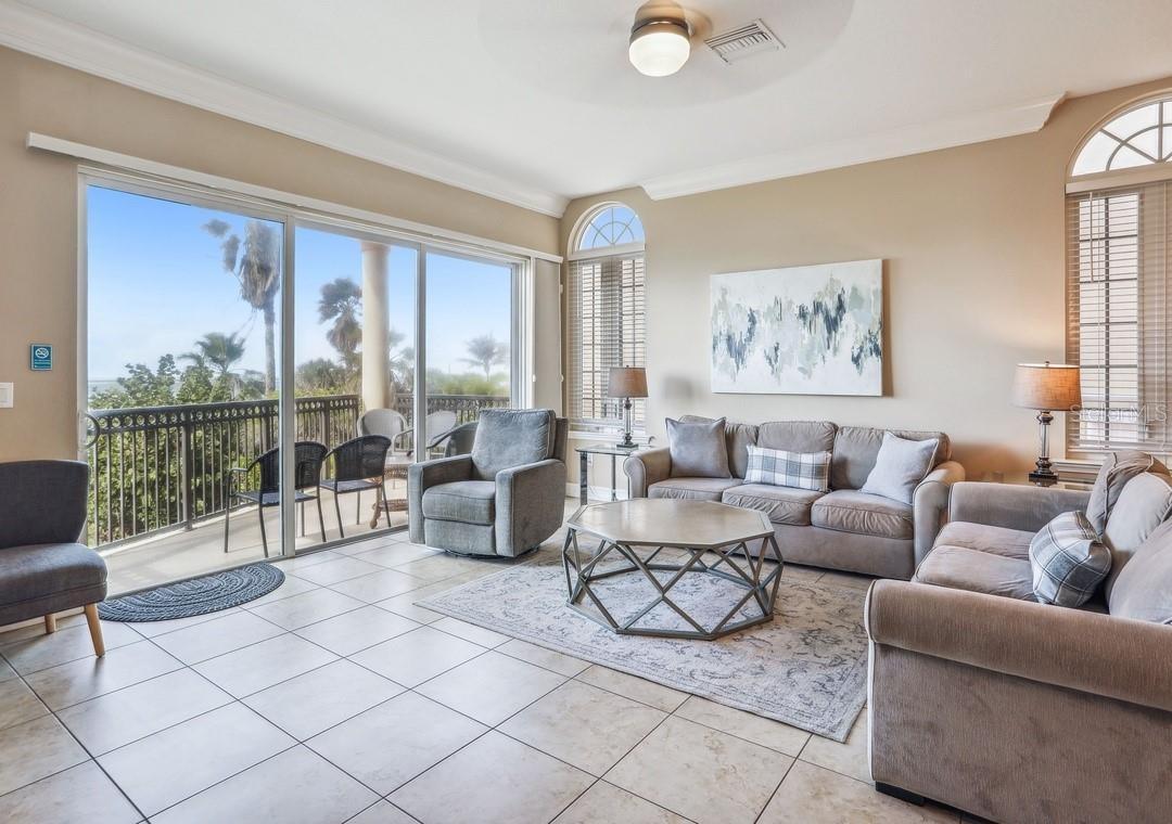 “An elevated living space blending comfort, style, and serene waterfront scenery.”