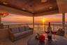 “Golden-hour tranquility from your private Gulf-front terrace.”