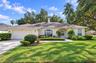 Beautiful Bloomingdale pool home positioned on an oversized corner lot.