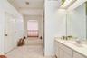 En-suite bathroom offers a relaxing and functional private retreat.