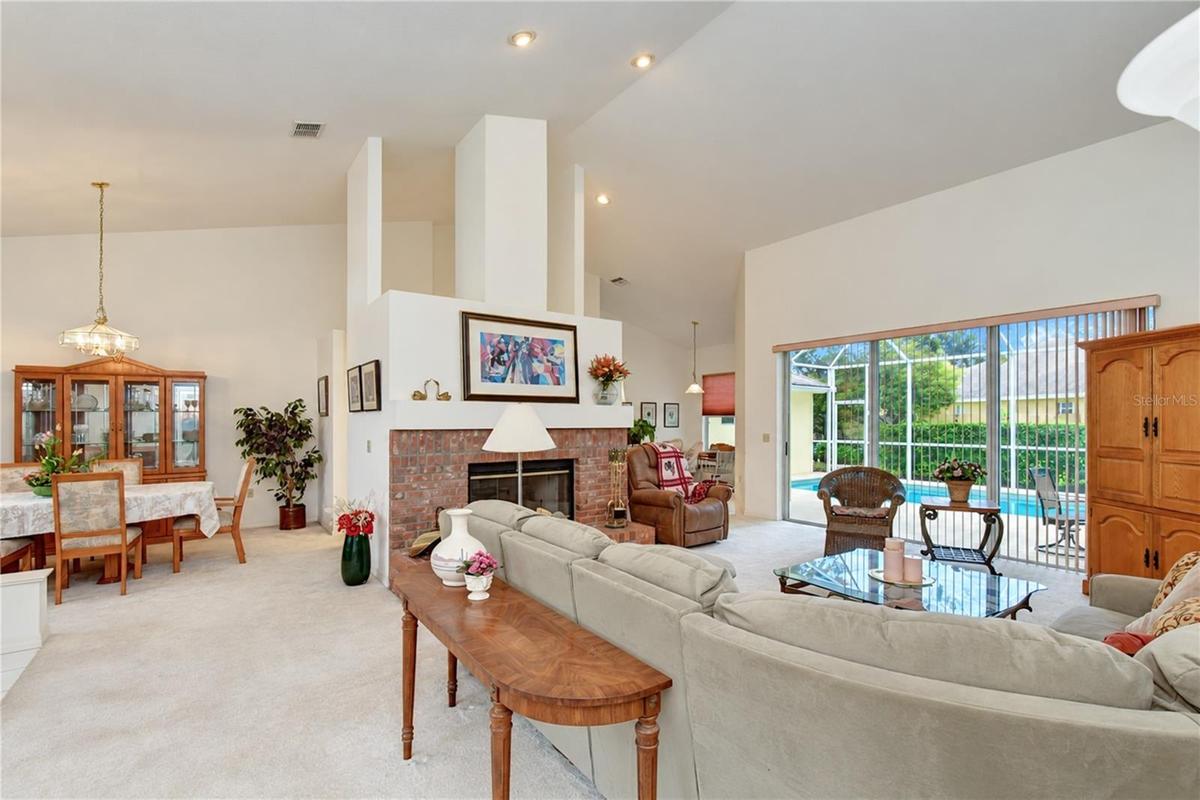 Adjoining dining area provides plenty of space for family meals and entertaining.