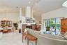 Adjoining dining area provides plenty of space for family meals and entertaining.
