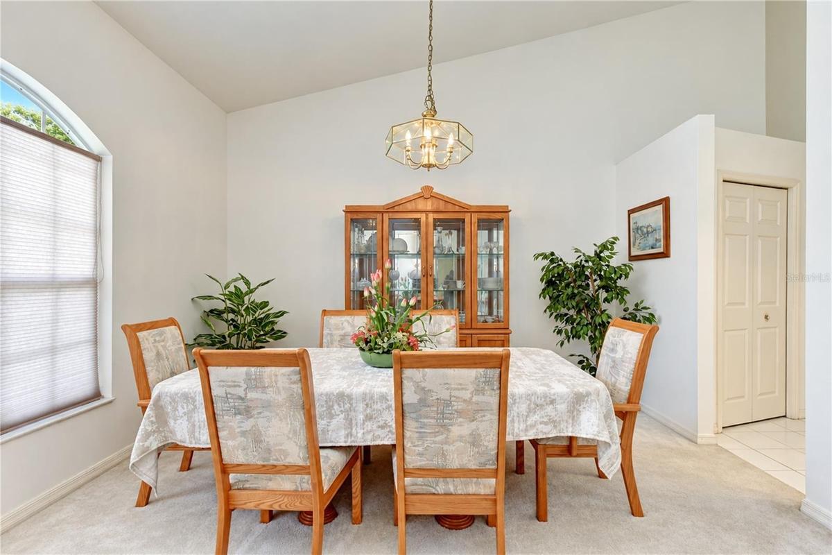 Adjoining dining area provides plenty of space for family meals and entertaining.