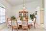 Adjoining dining area provides plenty of space for family meals and entertaining.