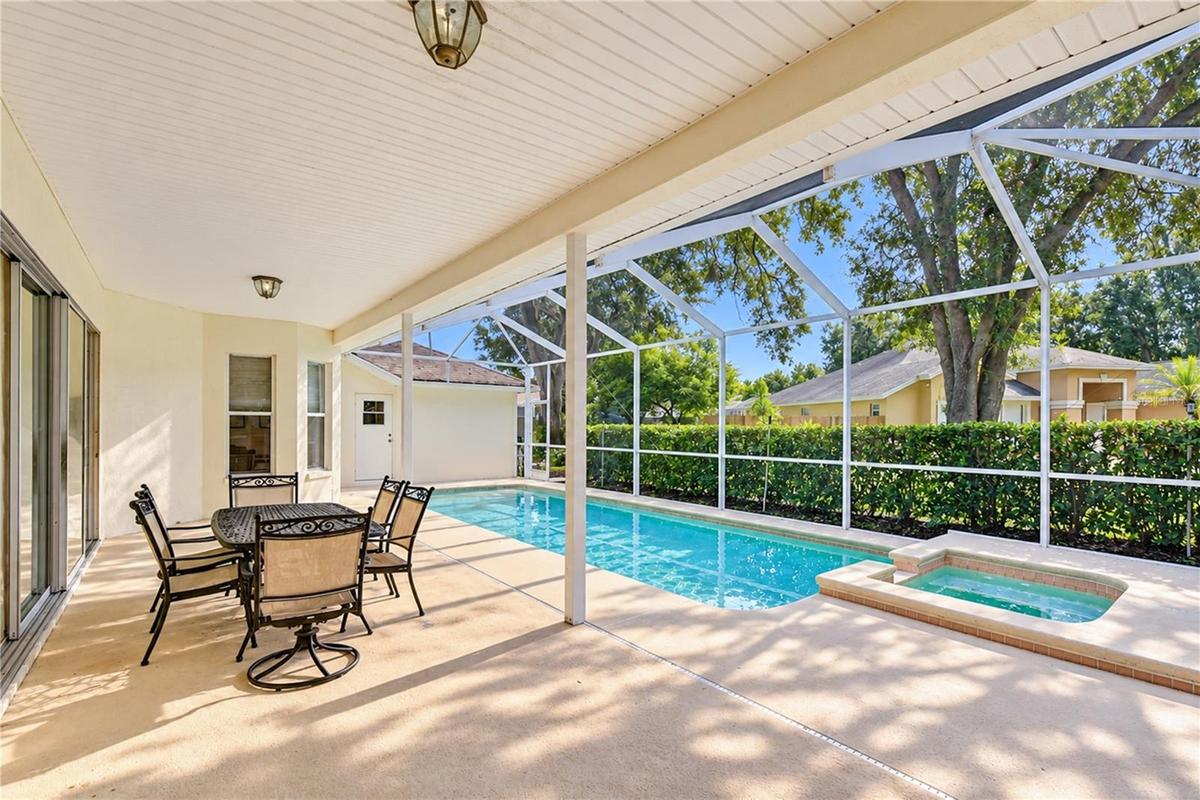 Private screened pool and spa create a resort-style outdoor retreat.