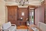 The last built-in cabinet door opens to reveal a "secret" private door to the exterior leading to right side garage from covered walkway.