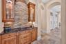 The beverage bar is easily accessible from the kitchen seen to the right.