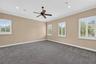 Midway up the stairs lies this large BONUS room with storage closet. The only room with carpet in the house and once used as FITNESS/WELLNESS ROOM. A 