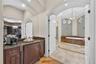Within the builtin coffee bar is a ULINE beverage refrigerator.