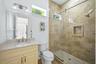 bathroom that Bdrm 3 and 4 share